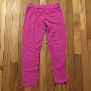 Dark pink colored capri pants for girls.